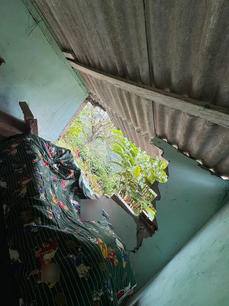 Muro colapsado por el sismo en vivienda veredal de La María